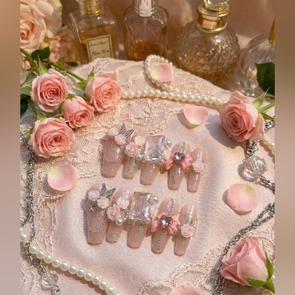 Elegant Pink Nail Coffin Set With Blinged Accents